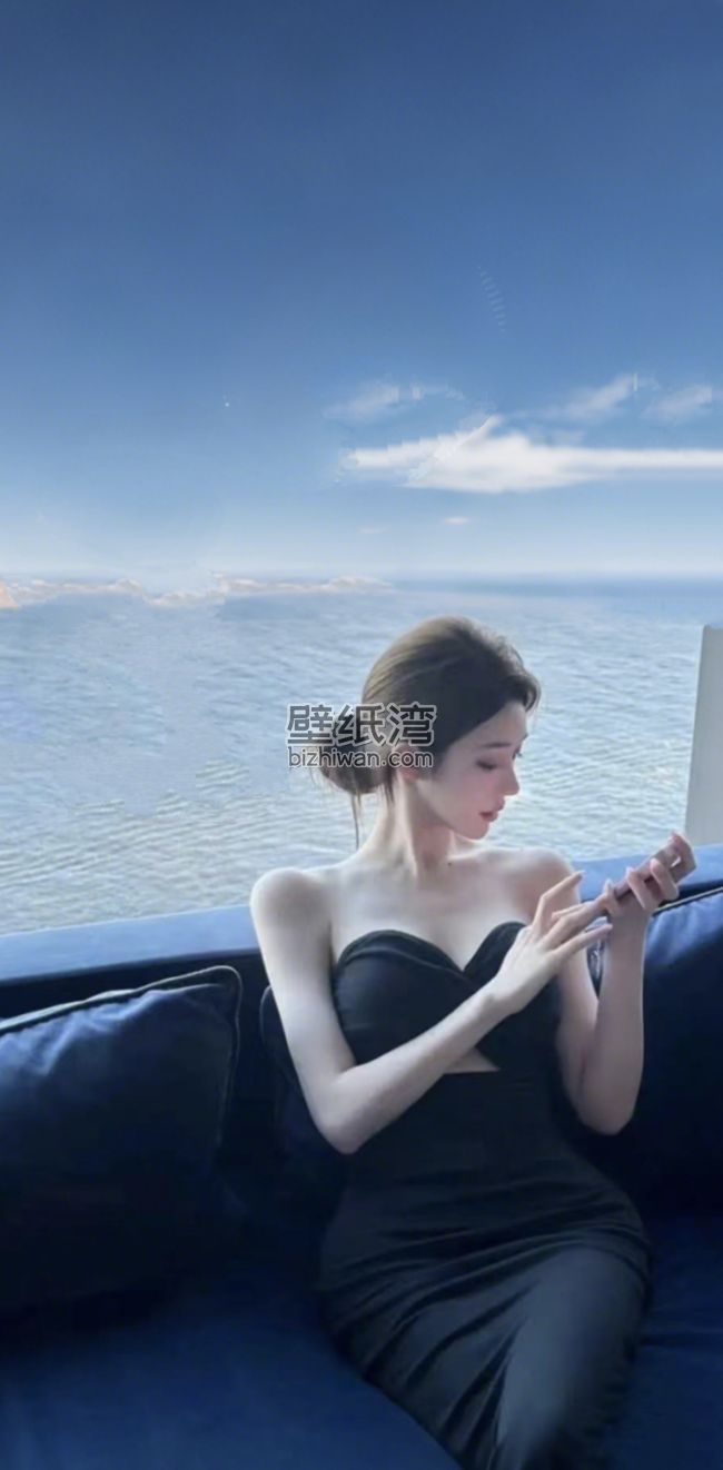 海边性感美女黑色低胸礼服手机壁纸图片