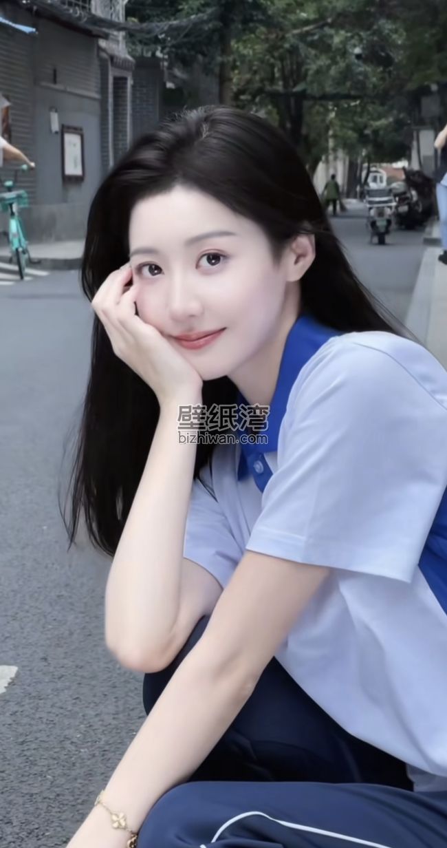 穿着校服的女孩蹲在街道旁，手机壁纸图片
