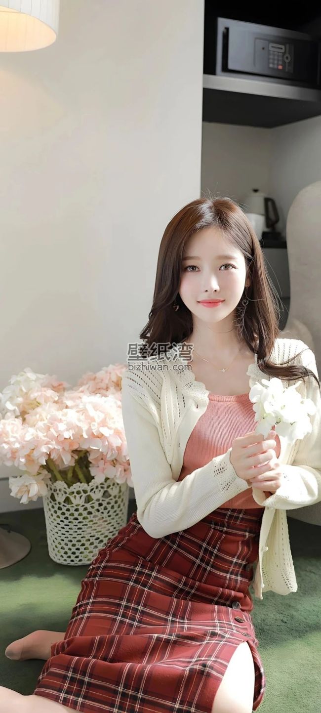 身穿粉色上衣和格子裙的美女拿着白色花朵 825*1832壁纸图片